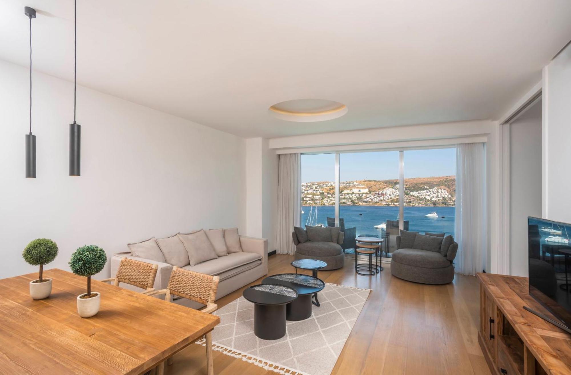 Cape Bodrum Luxury Hotel & Beach Gündoğan Zewnętrze zdjęcie A living room in a typical apartment